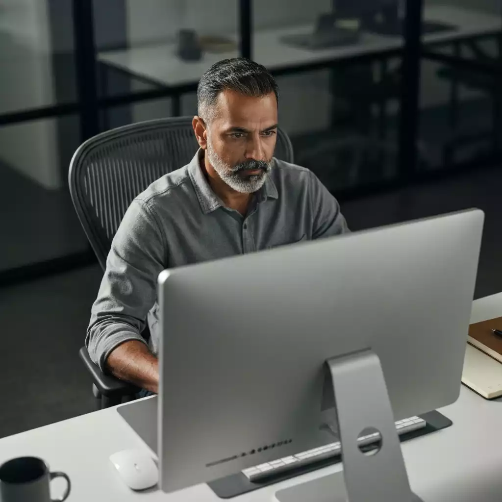 Person working comfortably in an ergonomic office chair