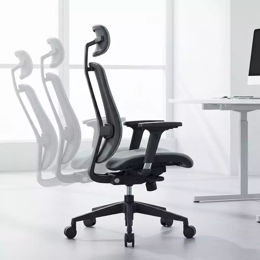 Modern ergonomic office chair in a bright, clean office setting, highlighting adjustable features